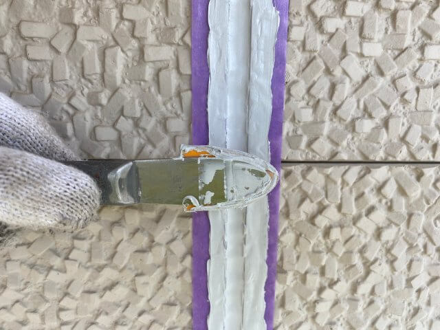 ヘラ押え